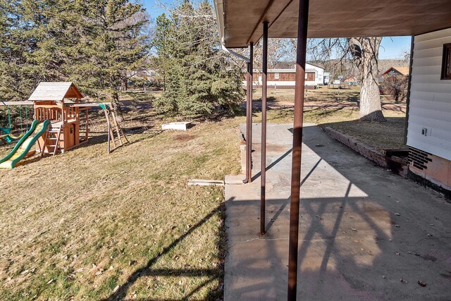 view of yard with a playground