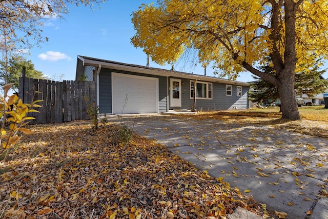 single story home featuring a garage