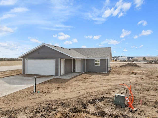 10899 Eagle Ct, Belle Fourche, SD 57717 - ranch-style house featuring a garage and driveway