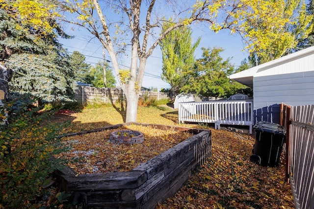 view of yard with a deck