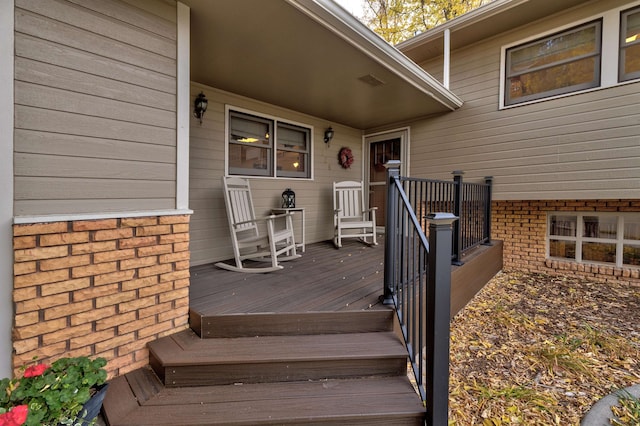 doorway to property featuring a deck