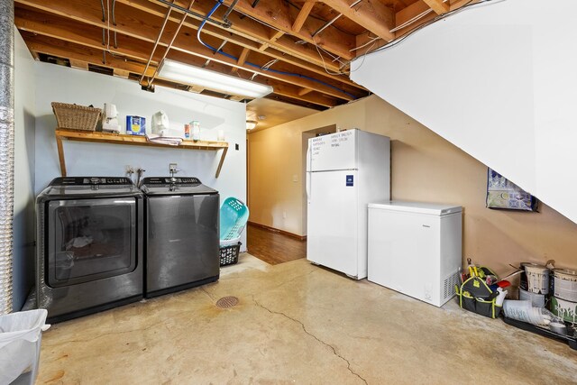 laundry area featuring washer and clothes dryer