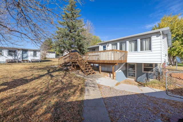 view of front facade featuring a wooden deck