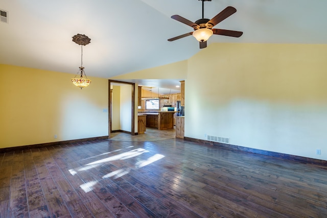 interior space with dark wood-type flooring, ceiling fan, and lofted ceiling