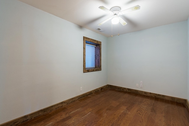 spare room featuring ceiling fan and wood-type flooring