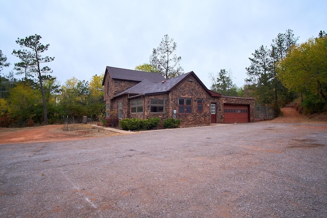 view of front of property featuring a garage