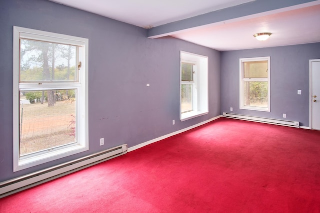 carpeted empty room with a baseboard heating unit, beamed ceiling, and plenty of natural light