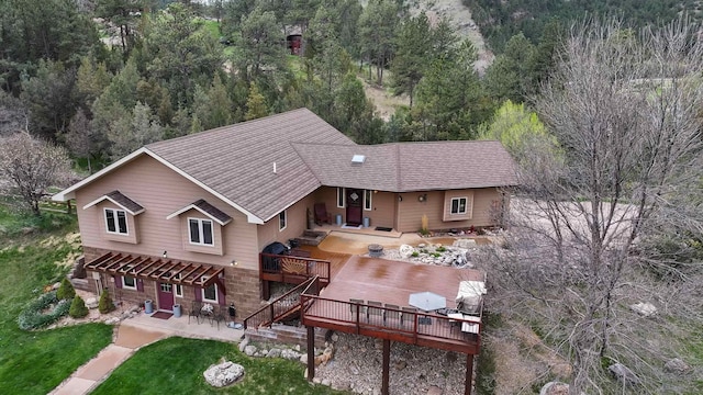 view of front of house featuring a patio and a deck