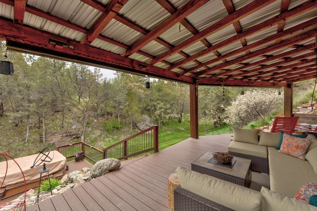 wooden terrace with outdoor lounge area