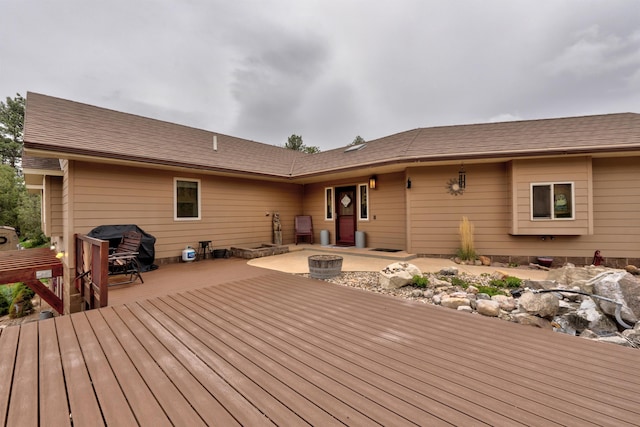 wooden deck featuring a patio