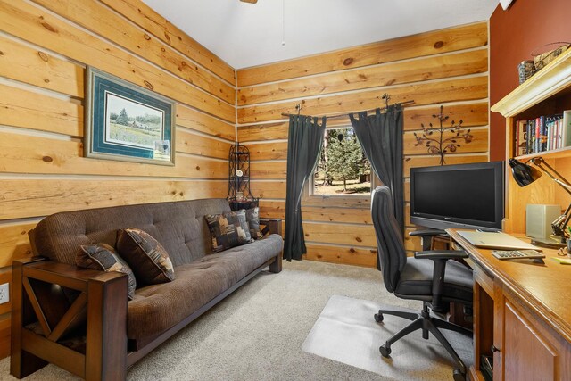 home office featuring wooden walls and light carpet