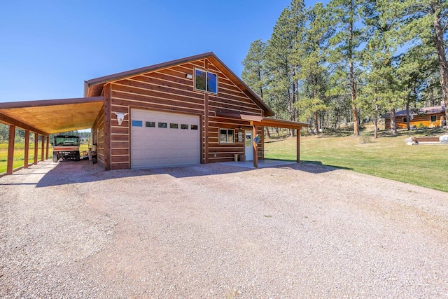 view of front of home featuring a garage, a carport, and a front yard