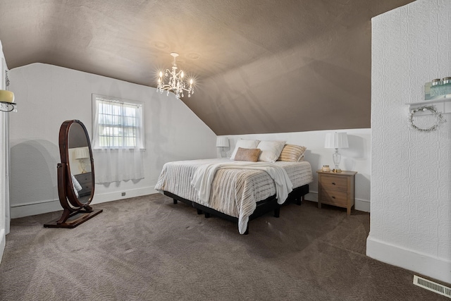 carpeted bedroom featuring an inviting chandelier, vaulted ceiling, and a textured ceiling