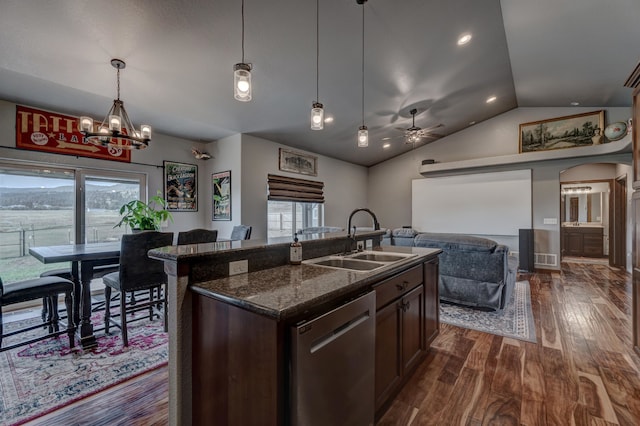 kitchen featuring dark wood-type flooring, vaulted ceiling, dishwasher, sink, and dark brown cabinets