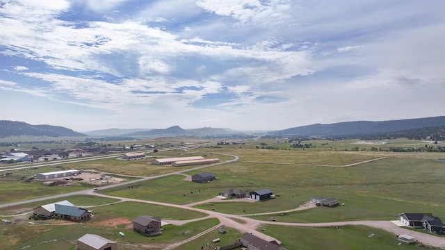 aerial view with a mountain view and a rural view