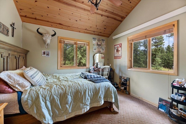 carpeted bedroom with vaulted ceiling and wooden ceiling