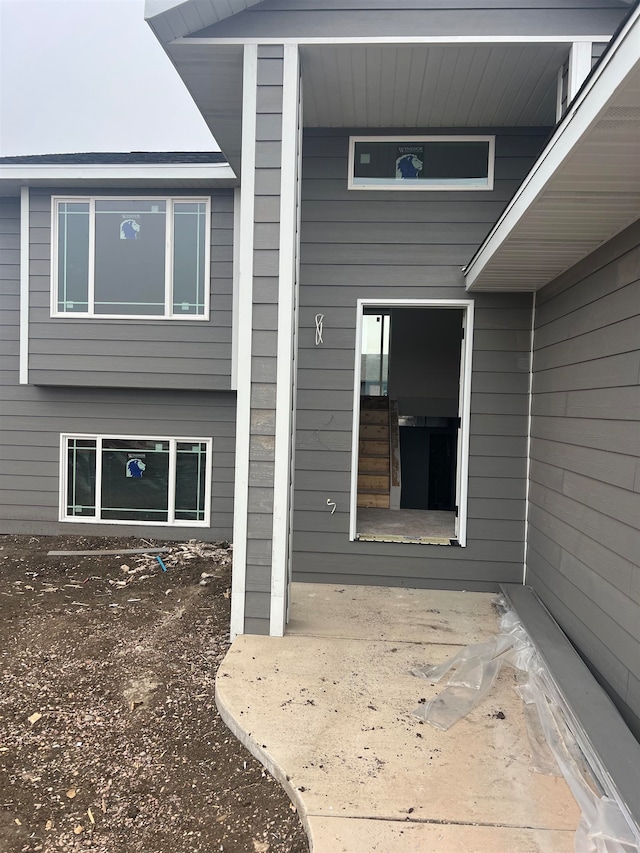 doorway to property featuring a patio area