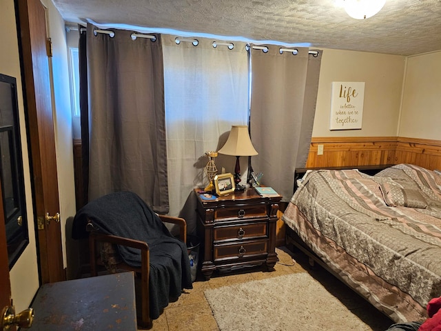 bedroom featuring a textured ceiling