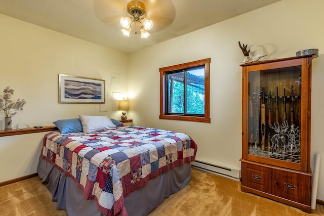 bedroom with ceiling fan, a baseboard heating unit, and light colored carpet