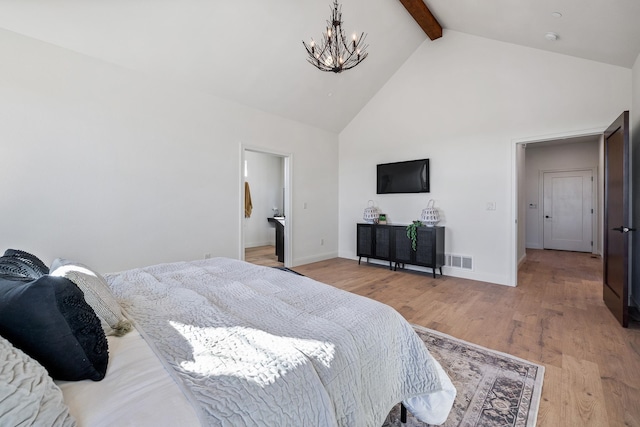 bedroom featuring beamed ceiling, high vaulted ceiling, and light wood-type flooring