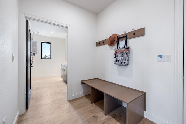 mudroom with light hardwood / wood-style flooring