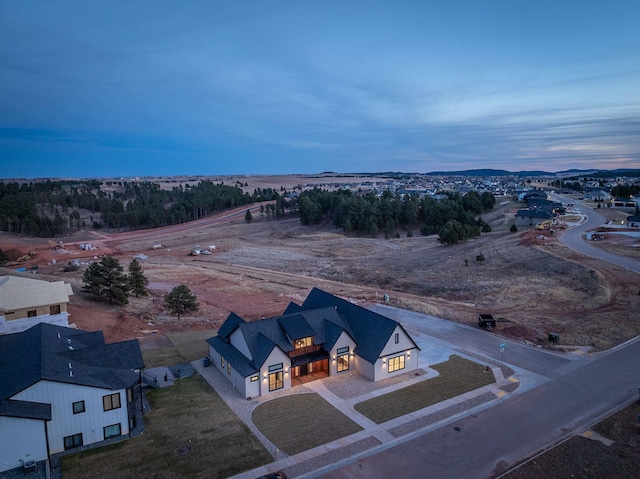 view of aerial view at dusk