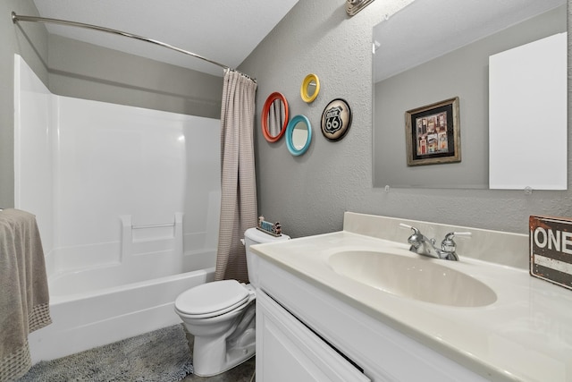 full bathroom featuring a textured ceiling, vanity, toilet, and shower / bathtub combination with curtain