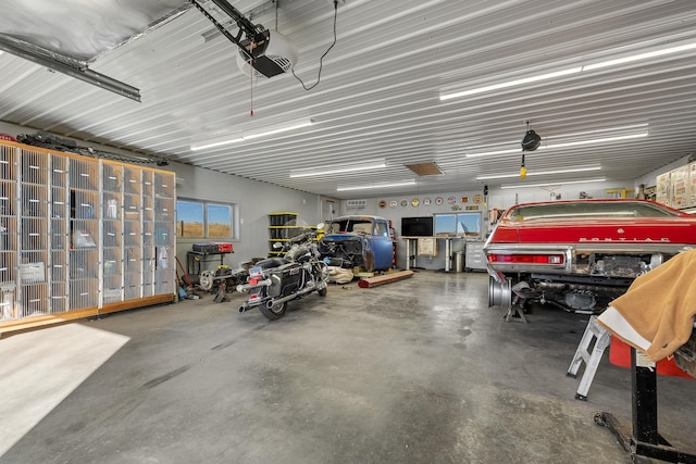 garage featuring a garage door opener