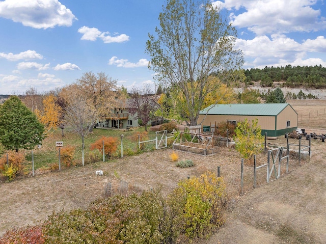 view of yard with a rural view