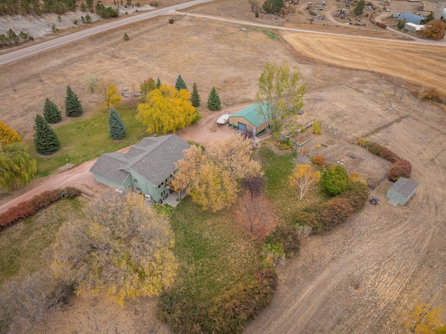 birds eye view of property featuring a rural view