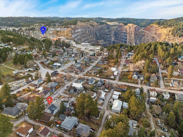 drone / aerial view featuring a mountain view