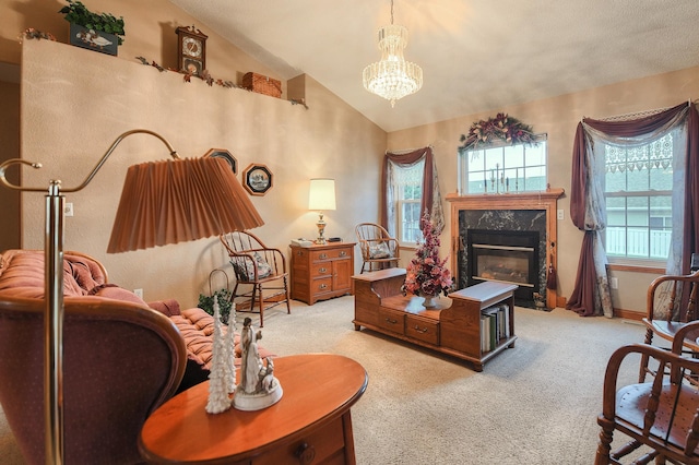 sitting room with light carpet, a chandelier, vaulted ceiling, and a premium fireplace