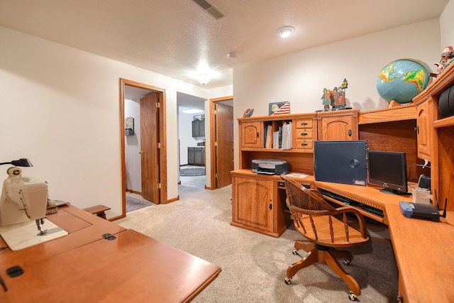 office space with light colored carpet