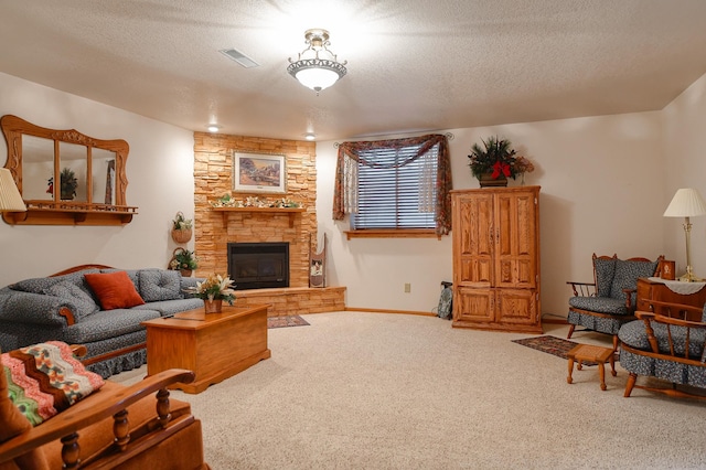 carpeted living room featuring a stone fireplace and a textured ceiling