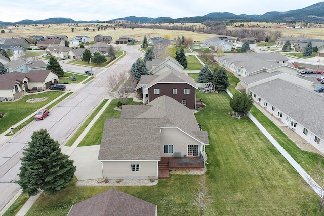 drone / aerial view featuring a mountain view