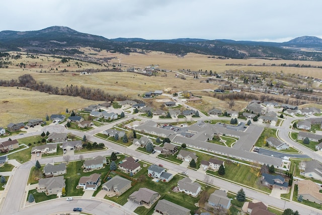 drone / aerial view featuring a mountain view