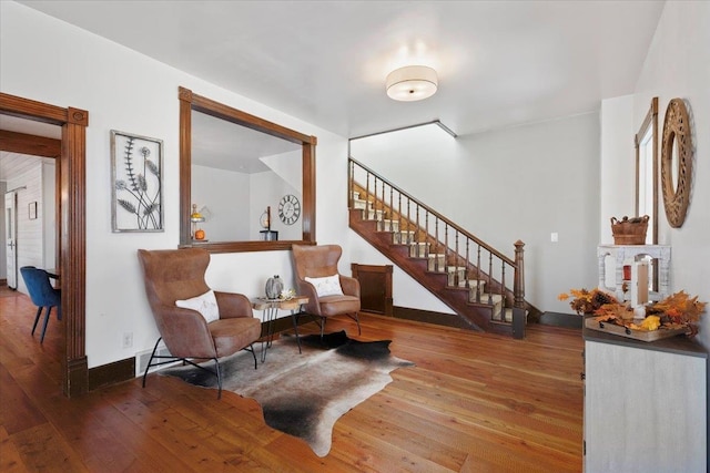 sitting room featuring wood-type flooring