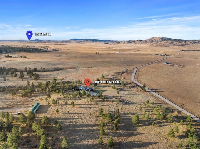 aerial view featuring a mountain view and a rural view