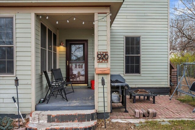 doorway to property featuring a patio