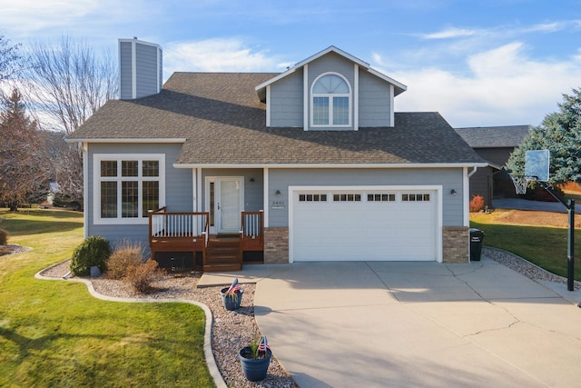 view of front facade featuring a garage and a front yard