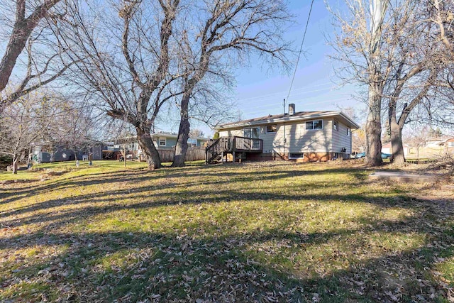 view of yard featuring a deck