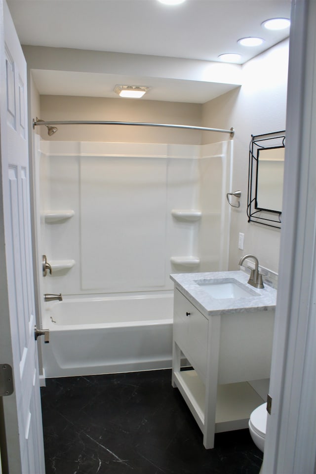 full bathroom featuring vanity, toilet, and tub / shower combination