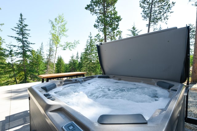 view of patio / terrace with a hot tub