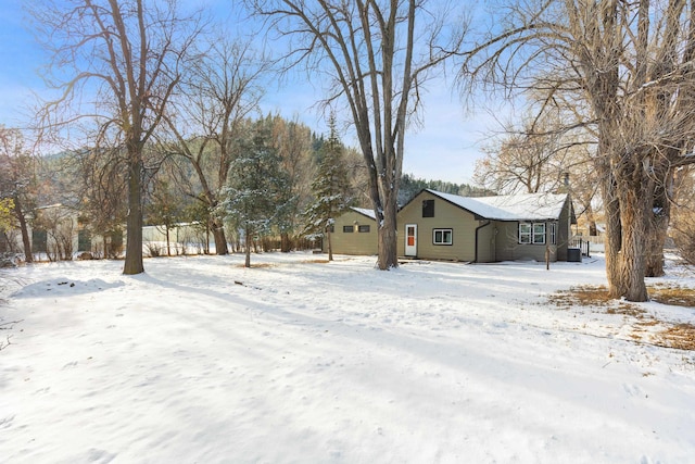 view of yard covered in snow