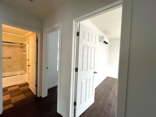 hallway featuring dark hardwood / wood-style floors and ornamental molding