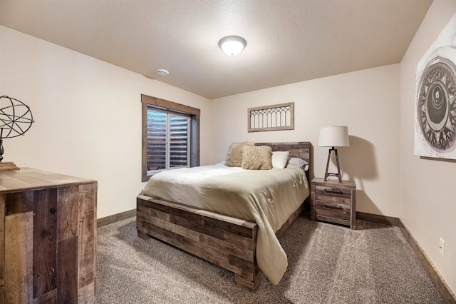 carpeted bedroom with a textured ceiling