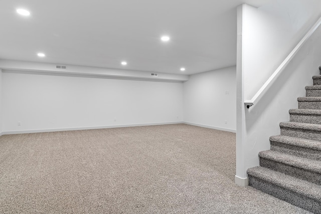 basement with carpet flooring