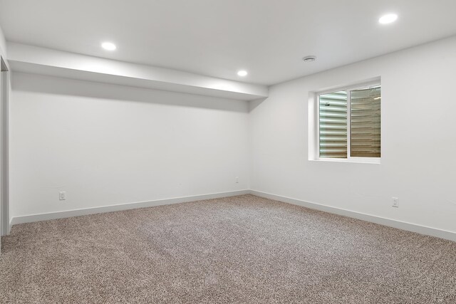 unfurnished room with carpet floors