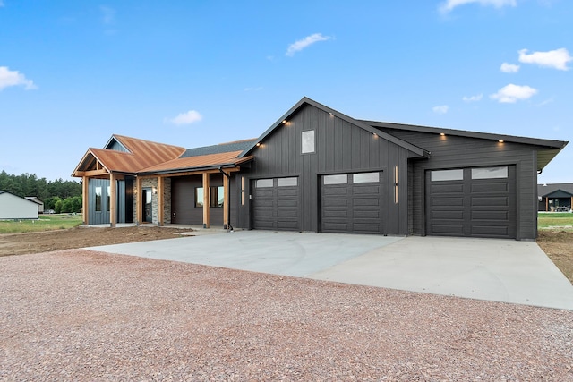 modern farmhouse style home with a garage