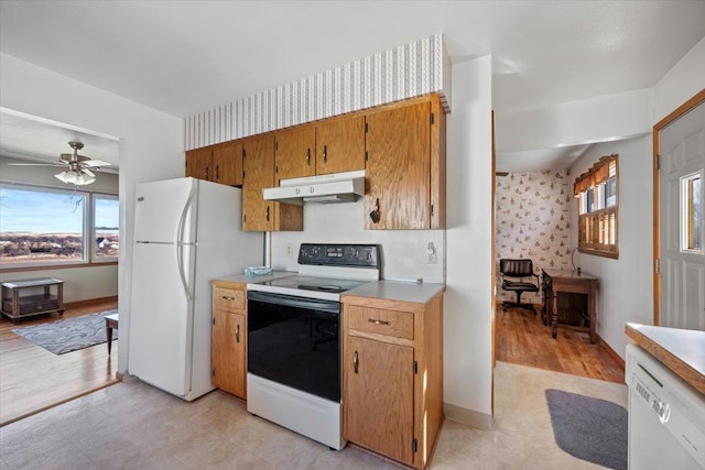 kitchen with ceiling fan, white appliances, and light wood-type flooring